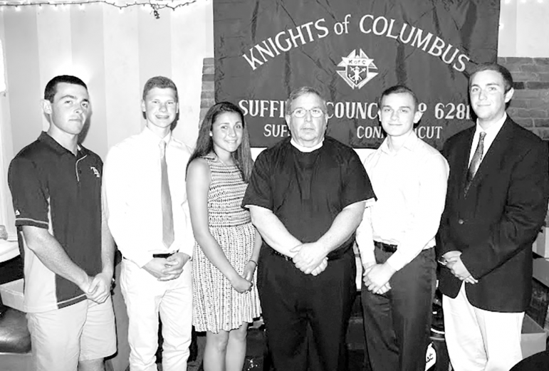 Pictured with Fr. Michael DeVito at the Knights of Columbus dinner June 4 are five scholarship winners. From the left: Michael McDermott, Austin Mankouski, Caelee Sorto, Fr. DeVito, Bradley Grimard and Thomas Drakely, Jr. Absent from the photo was Colleen McAnaney.