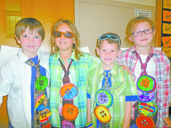 At the left Groovy Button Band members Christian Fry, Ella Kettles, Andrew Van Cott, and Alexandra Eddy are ready for their performance. 