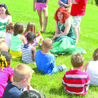 Spaulding School kindergarteners enjoy a snack and meet and greet with the little mermaid Ariel, played by Jaime Pearsons, at a recent field trip to the Red Door Theatre.
