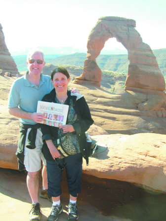 Steve Dunn and Ann Borracci, celebrating their 30th wedding anniversary, pose with the Observer for an early May moment in southeast Utah among the thousands of wind-carved arches in Arches National Park. Congratulations, travelers!