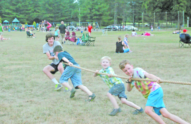 An unidentified bunch of good pullers won this informal tug-of-war match.
