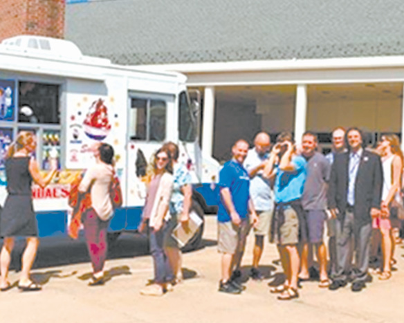 Suffield High School teachers line up for the ice cream truck after the “Welcome Back” convocation on August 26, five days before the students’ first day.