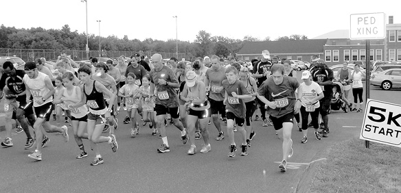 The 5K Run participants, encompassing a wider age range, set out at the same spot as the 10K Road Race, but 15 minutes later.