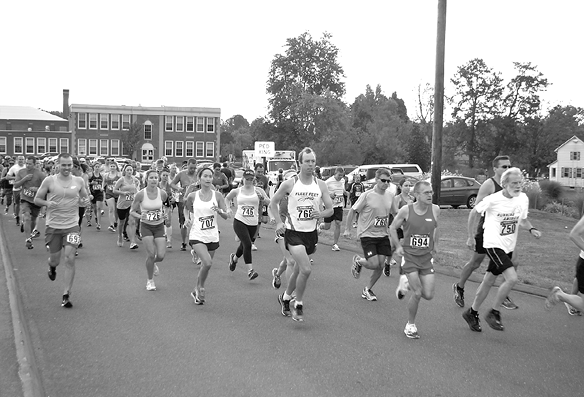 Runners in the 10K Road Race set out at the same spot 15 minutes ahead of the 5K start.