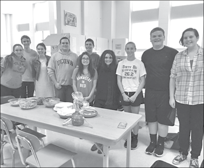 Suffield High School Spanish students are pictured with the traditional guacamole, salsa fresca, and other dishes they made with Ms. Cossman for the Hispanic Heritage week celebration in mid-October.