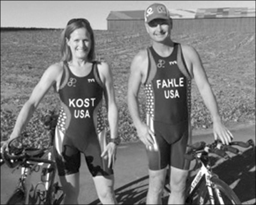 Paused for a moment on Hill Street recently are two local residents training for serious, international competition. Chelen Kost and Brant Fahle are long distance triathlon athletes.