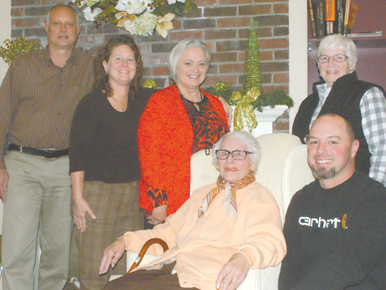 Members of the Suffield Housing Authority are pictured January 10 in the Maple Court recreation room at the little dinner party they gave Vi Carney for her 92nd birthday. Surrounding Vi are, clockwise from upper left, Chairman Jon Carson, Secretary Kim Emmons. Executive Director Deborah Krut, Treasurer Kathy Remington, and maintenance superintendent Patrick O’Sullivan. Mrs. Carney, who has been a member of the Authority for 47 years, is its vice chair.