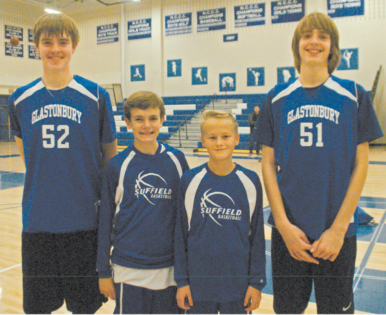 About 15 minutes after the Suffield-Glastonbury 8A Travel Basketball game on December 11, these contestants were gathered for a portrait. From the left: Cooper Limric, Sam Potter, Dan Casinghino, Brady Limric. (The Limric brothers are triplets, but the third isn’t on the team.) The final score was 36-48. Suffield fought well, but didn’t prevail. All smiles nevertheless.