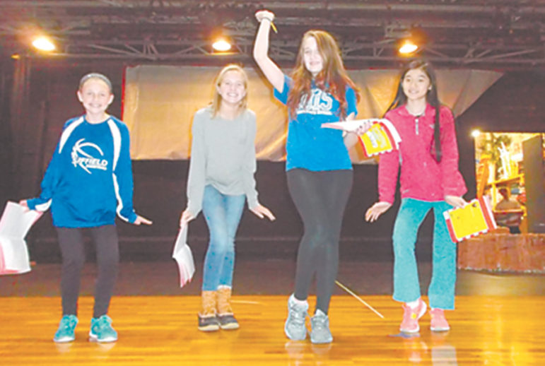 Preparing for the Suffield Middle School performance of Seussical, Jr., The Sour Kangaroo, played by Laura Drinkwater, rehearses with her backup singers, The Wickershams. Pictured from the left: Brynna Tinnerella, Cami Bosco, Laura, and Isabella Jiang.