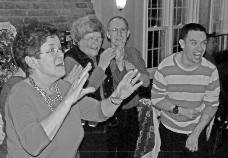 Parents Helene Segool, Carol Chipkin, and Robert Howe, Sr., join in with Paul Chabot and a crowd of almost a hundred when the Parks & Rec Bowling Buddies gathered at the Country Club for their annual holiday dinner party on December 13. The excellent dinner by Sam Karagiannis of the Sunset Tavern and the happy dancing with DJ Kevin Landolina made for a most successful party.