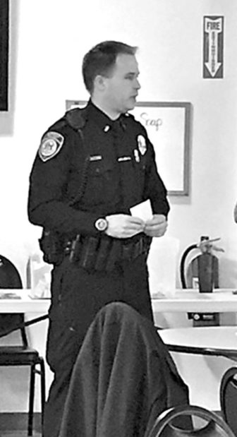 Lt. Ryan Burrell speaks to a Suffield Senior Center audience about proper disposal of prescription drugs.