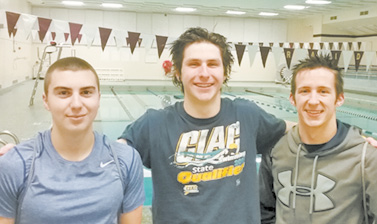 Pictured at the Windsor Locks pool, where the team practices, are members of the Suffield High School boys swim team. From the left: Oliver Burke, Captain Jack Butler and Captain Baily Martin, all seniors.