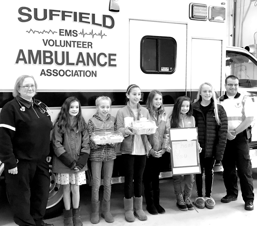 The Girl Scouts of Troop 10973 are pictured at the SVAA with EMTs Karen Lockery and Lieut. John Tarbell. The Scouts were making “thank-you” visits around town.