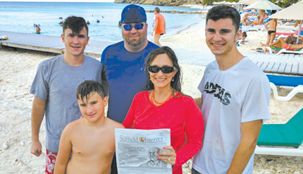 Mike and Jessica Zolciak and ther three sons took the Observer for beach reading in Curacao this winter.