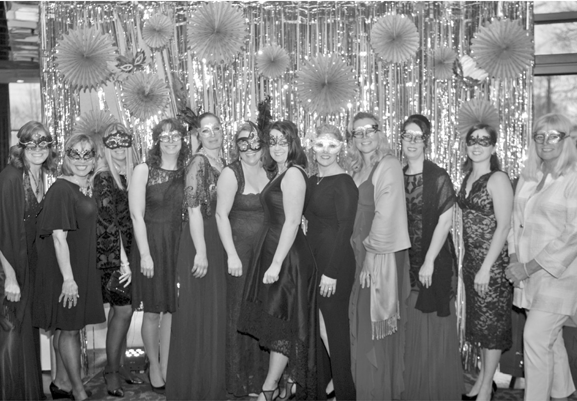 Members of the SFES Board are pictured in their Masquerade Ball finery at the SFES gala.
