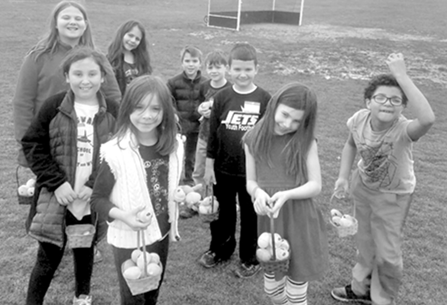 Happy kids are pictured during the Parks & Rec Easter Egg activity on April 5.  From the left, front: Keila Silva, Victoria Jacobs, Jillian Barrett, Juniel Crespo; back: Madelyn Eckley, Kaylee Herbert, Cameron Cioffi, Kaiden Alimbert-Charland, Mark Colson.