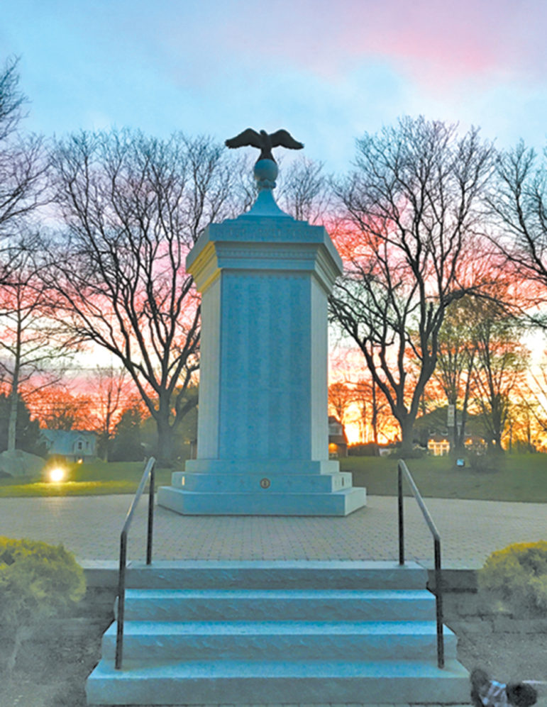 In early spring, walking at dusk in Veterans Park with her daughter and her dog, the photographer stopped at the Suffield Veterans Memorial to capture the lovely, delicate colors of the sunset.