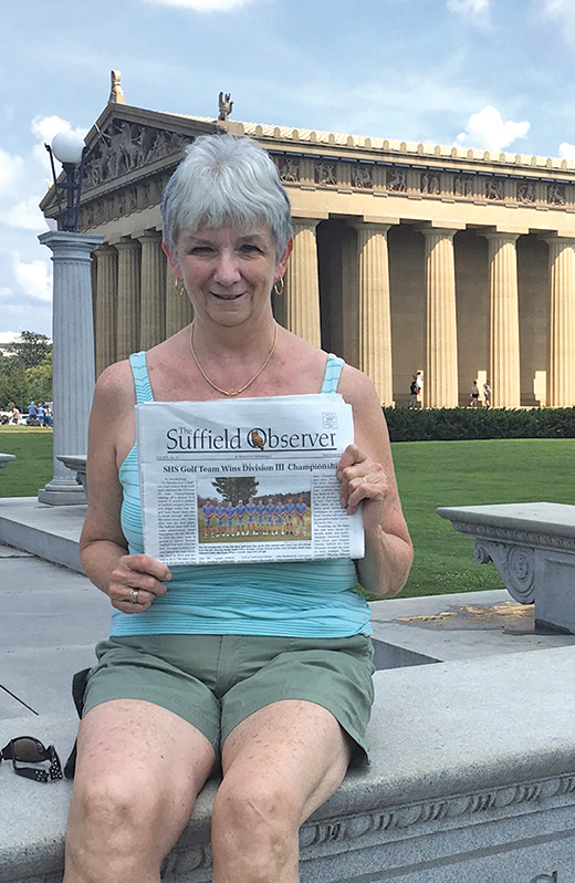 Suffield assessor Helen Totz was in Nashville on eclipse day in August and sat down with the Observer in Centennial Park on a bench engraved with one of the business skills of the park’s creator. In the background is Nashville’s concrete replica of the Parthenon, symbolizing Nashville’s slogan as “the Athens of the South.”