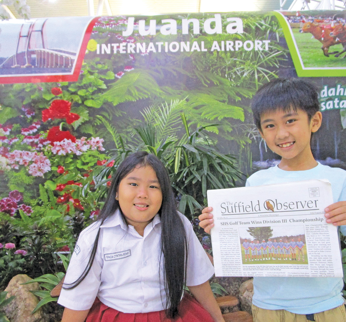 After a July visit with family and friends in Indonesia, Gatot and Yunita Suwomo remembered the Observer at the last minute. They took this photo of their son Willy with his cousin, Gracia, at the Juanda International Airport on the island of Java.