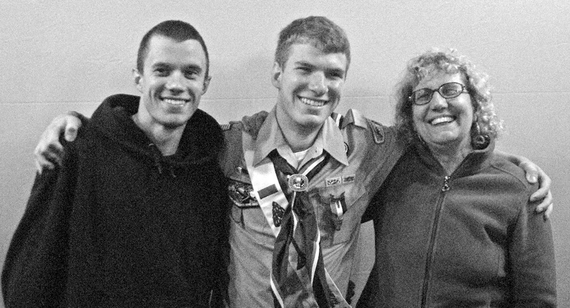 Having just received his Eagle Scout badge, earned over a year ago in Boy Scout Troop 66, Jon Hagenow poses happily on September 30 with his brother Chris and mom Suzanne.