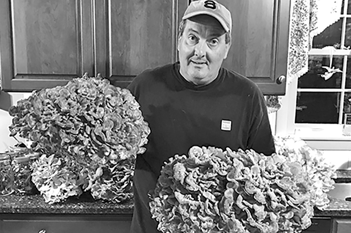 John Shelanskas displays the impressive harvest of one of his local mushroom forays.  He keeps his locations secret.