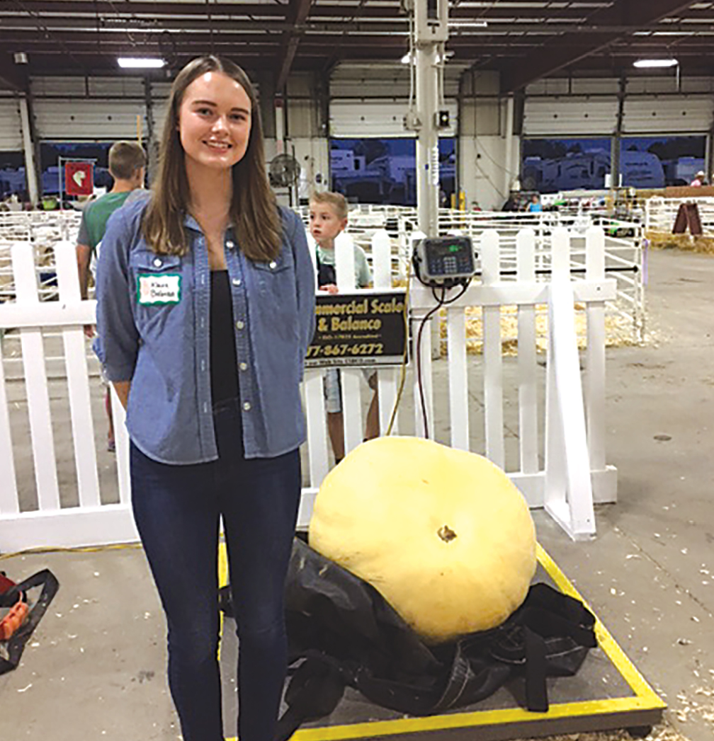 Klaire Bielonko wins Silver Medal at the Big E for her 197-pound giant pumpkin.