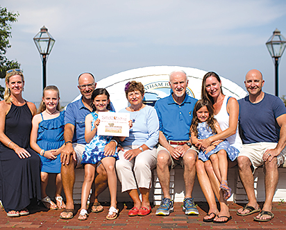 The Cerrato family found a nice spot for their photo during their annual trip to Chatham, Massachusetts, Cape Cod's elbow, early this summer.  From the left: Carrie, Elizabeth Peter, Frances (with the Observer), Joanne, Jack, Giada, Jen, and John.