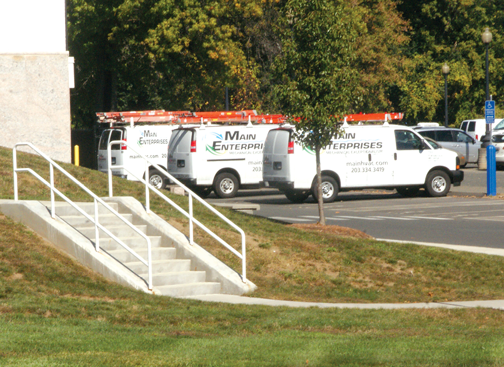 Vans from Main Enterprises, the company that provided and installed the new HVAC systems in the old and new parts of the Kent Memorial Library last year, returned in early October to replace faulty components.