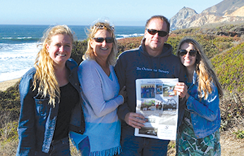 Visiting in Montara, California, in early October, the Life family and a friend bundled up and took the latest Observer to the beach.From the left: Maysie Childs, Lauren, Larry and Lindsay Life.