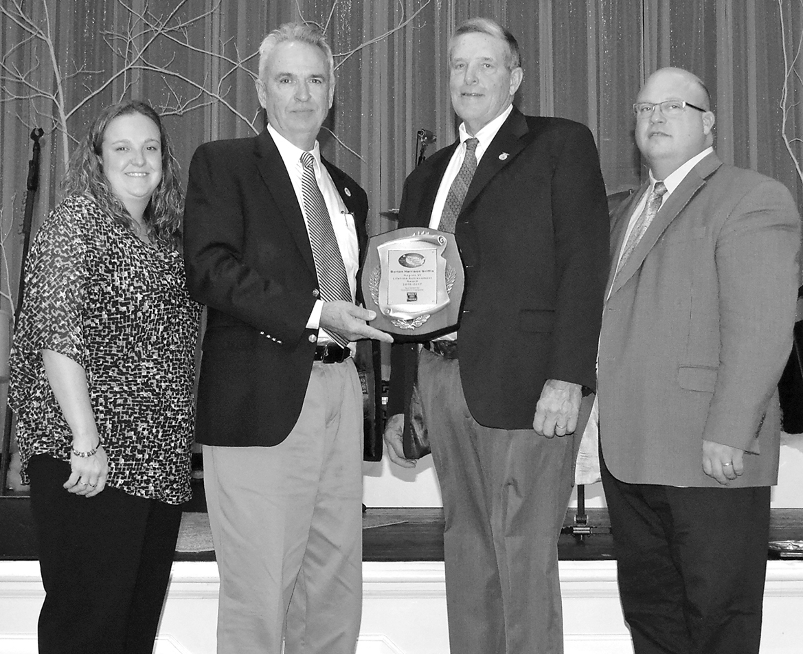 Former director of the Suffield Agriscience Center Harrison Griffin, third from left, is pictured with NAAE and FFA officials at the NAAE convention receiving his Lifetime Achievement Award.