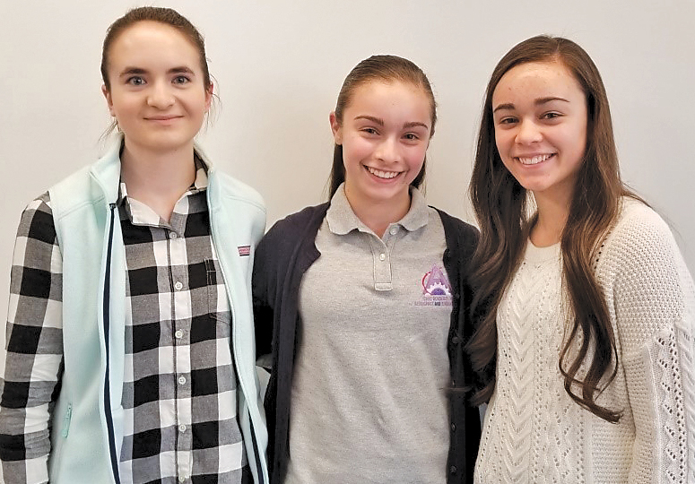 These three Suffield students were chosen as the Connecticut Second District winners of a national competition: the Congressional App Challenge.  From the left: Alexandra Smith, Gianna Guzzo and Marissa Guzzo. Their “Feel-Good” app took about 2,500 lines of code.