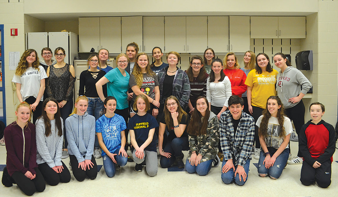 The entire cast for Suffield High’s mid-March production of Mary Poppins poses for a semi-formal portrait. The popular musical will be staged on March 15, 16, and 17.